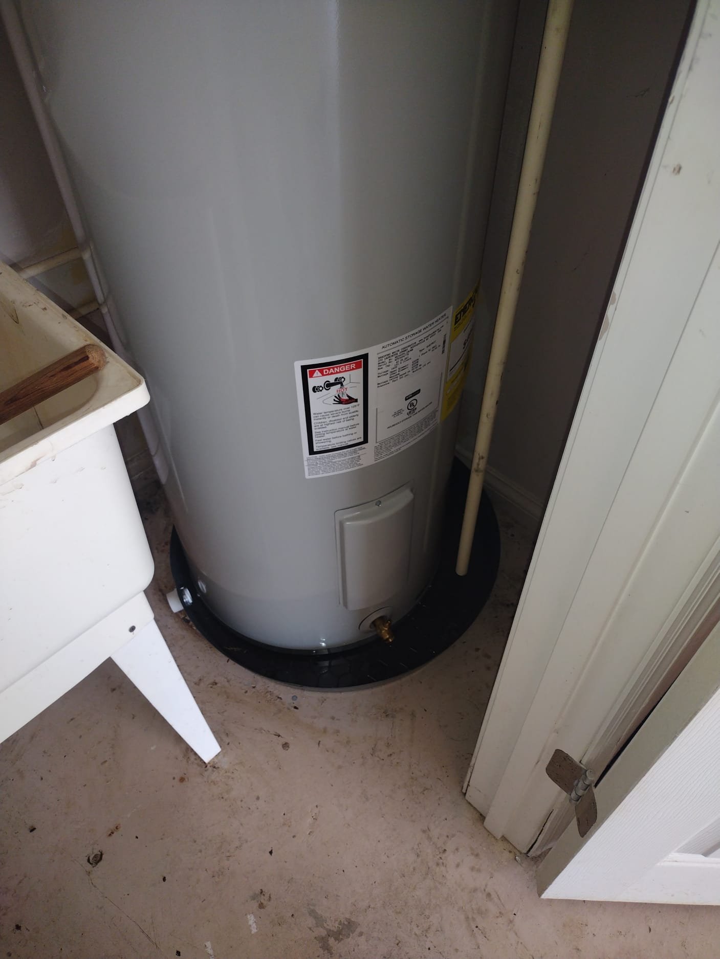 New water heater in a utility area