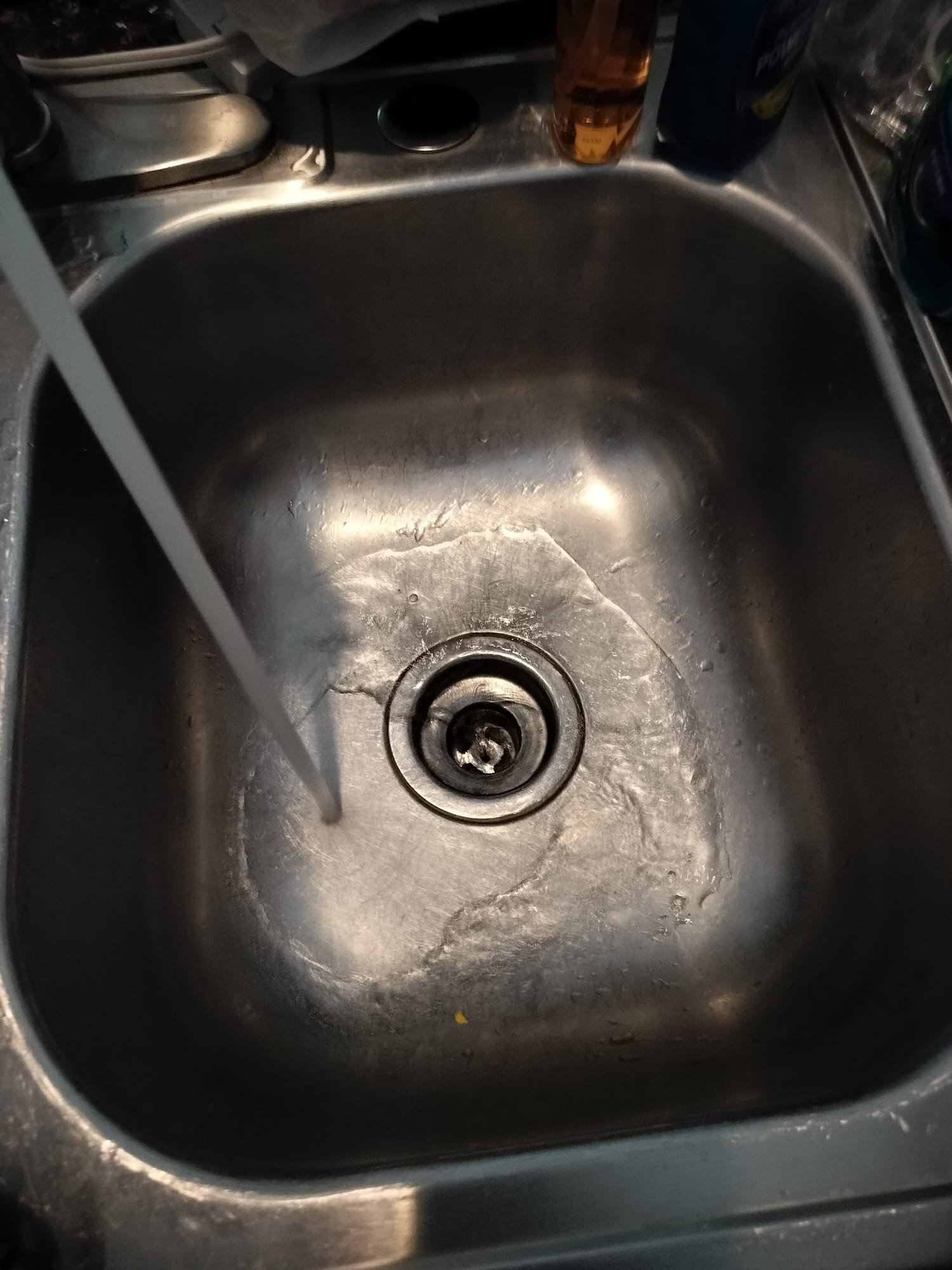 Stainless steel kitchen sink functioning well after routine test and maintenance