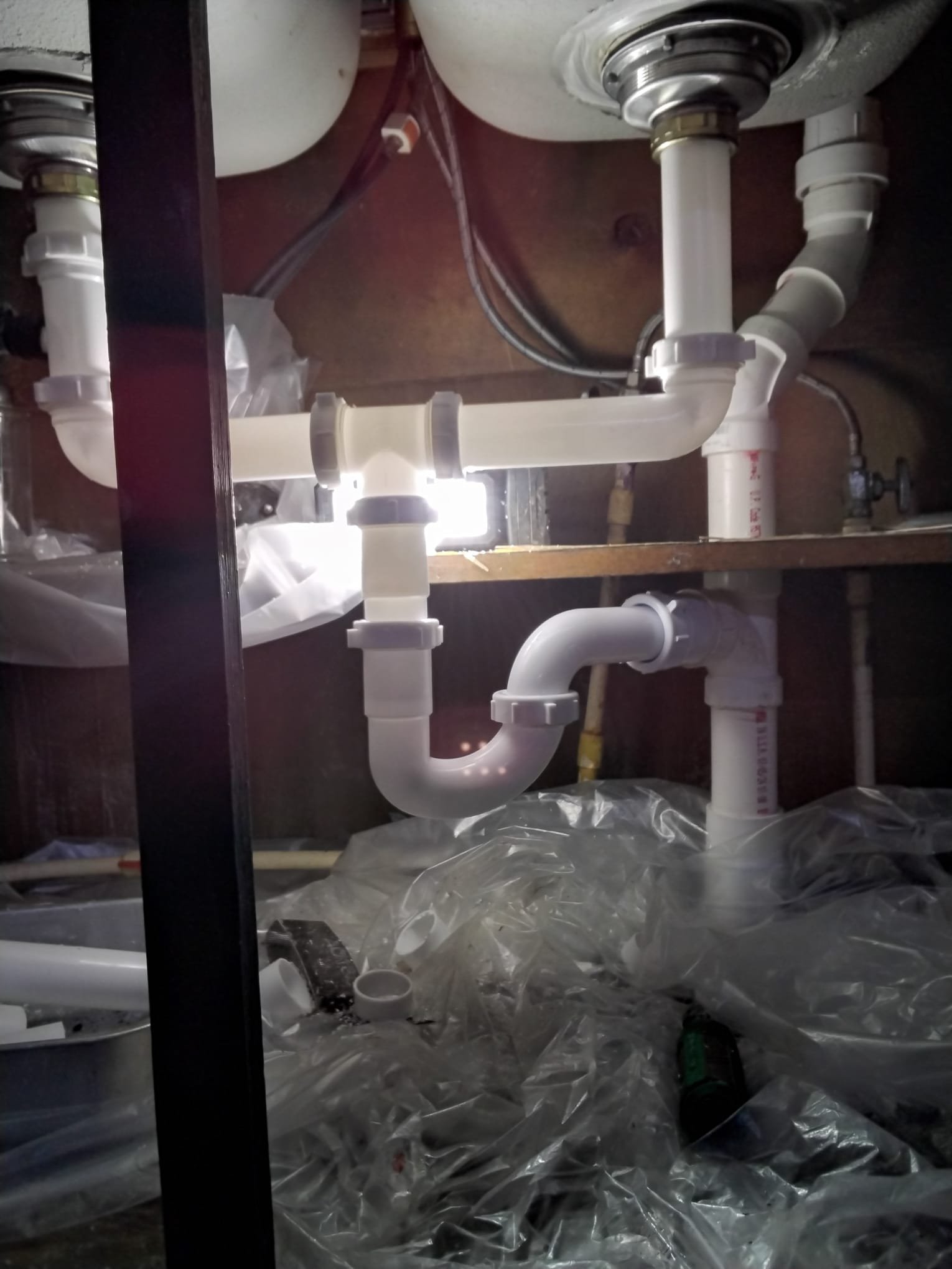 After repair image: a close-up view of the new plumbing setup