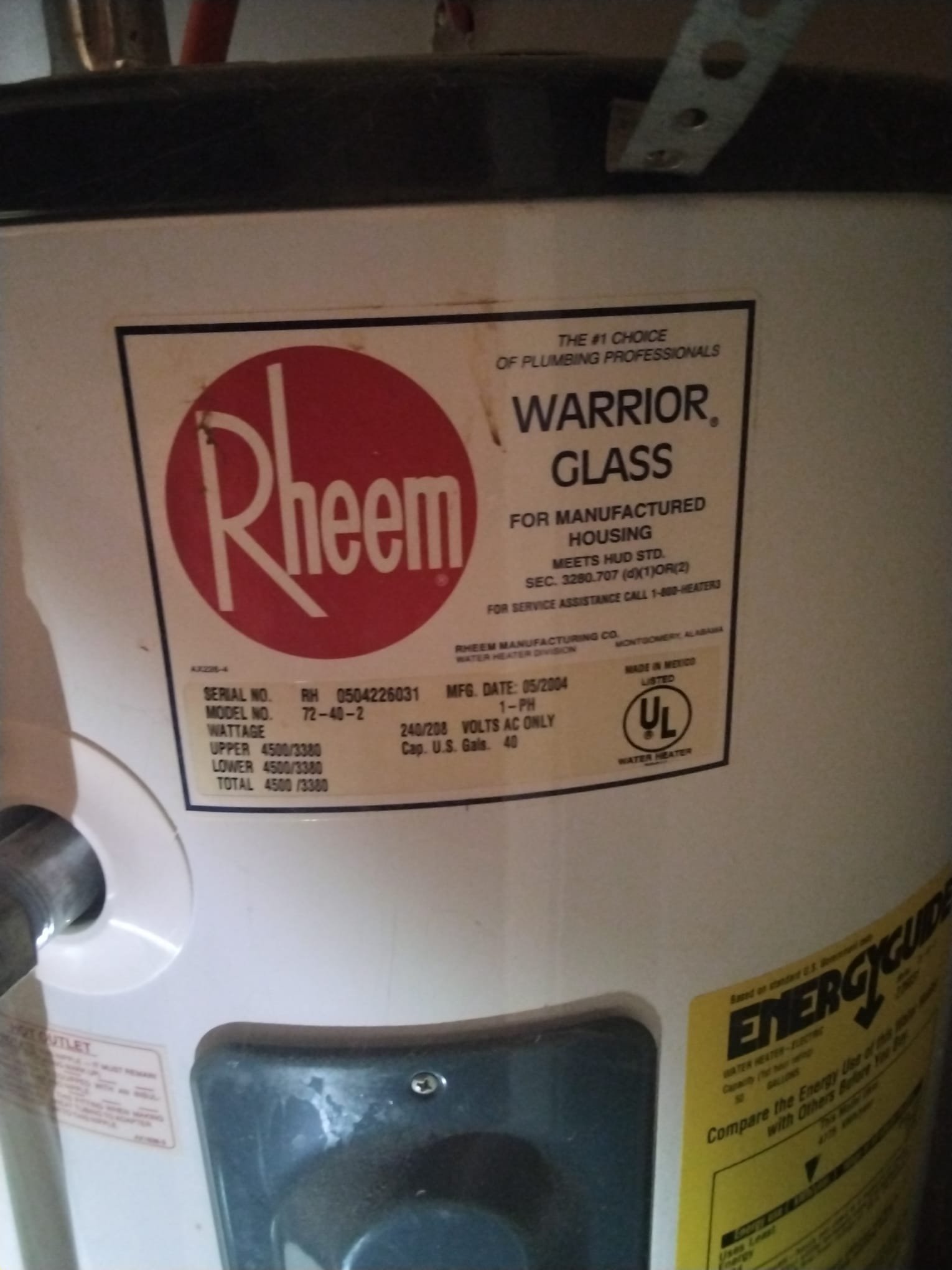 Older water heater in service: An example of equipment that, while functional, might benefit from a timely upgrade to ensure maximum efficiency.