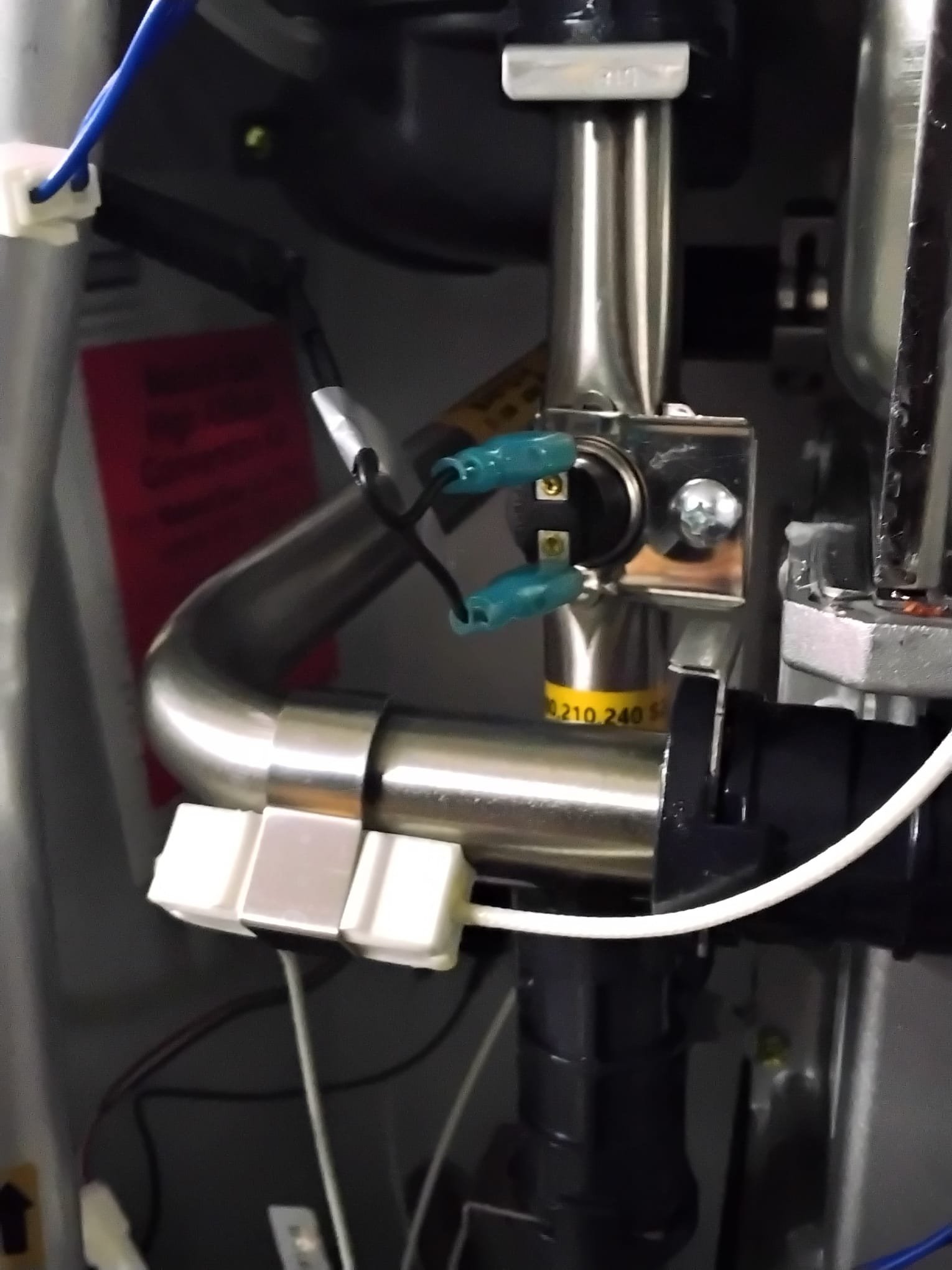 A well-maintained plumbing connection showcasing secure, shiny metal pipes