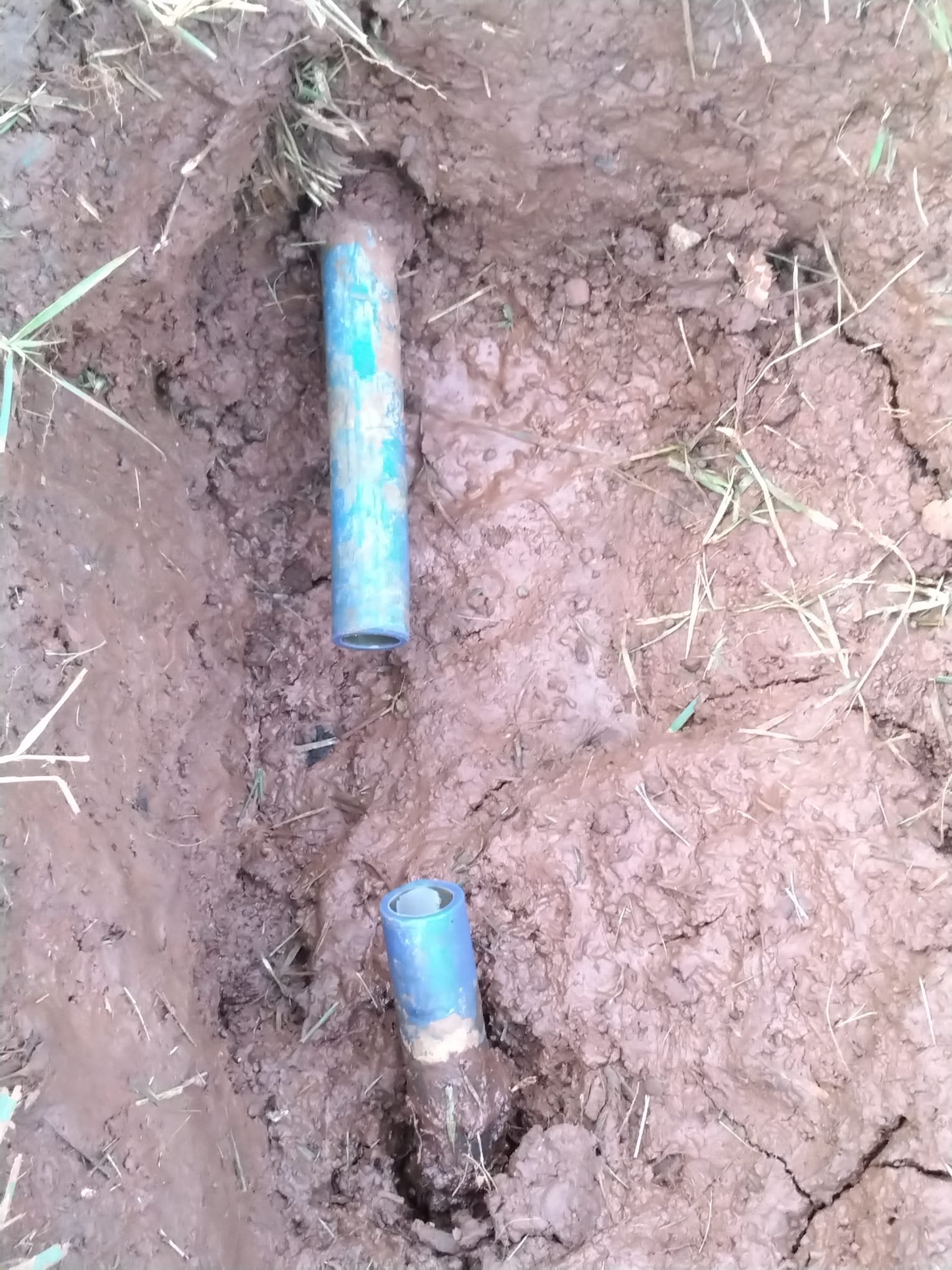 Before Repair: Exposed PEX Pipe Section