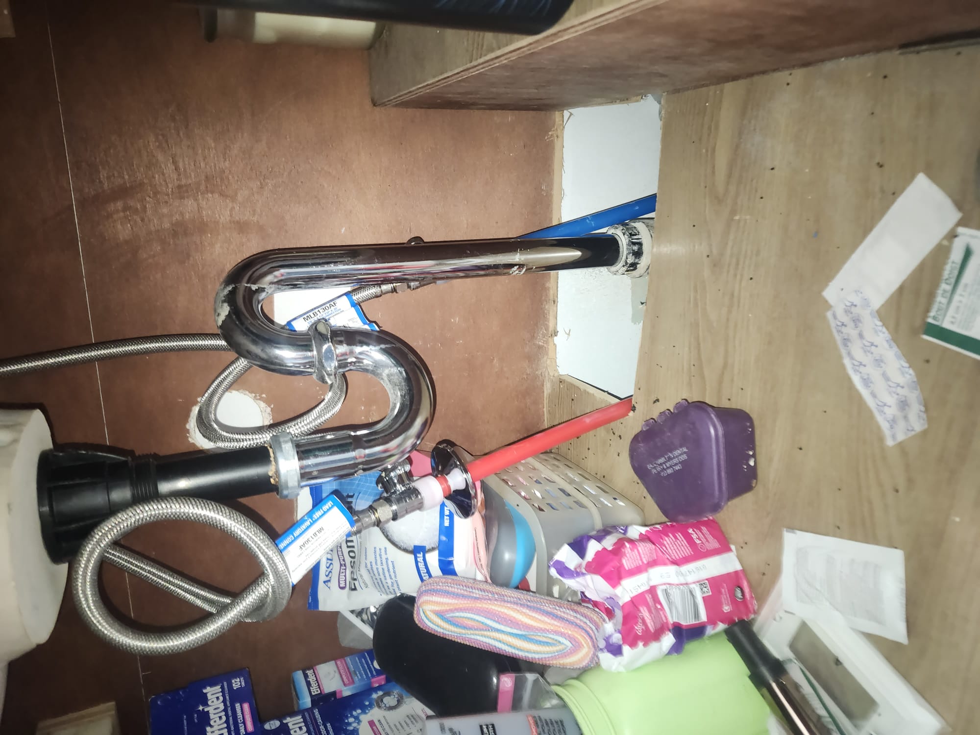 Clean PEX pipes and new P-trap under the sink