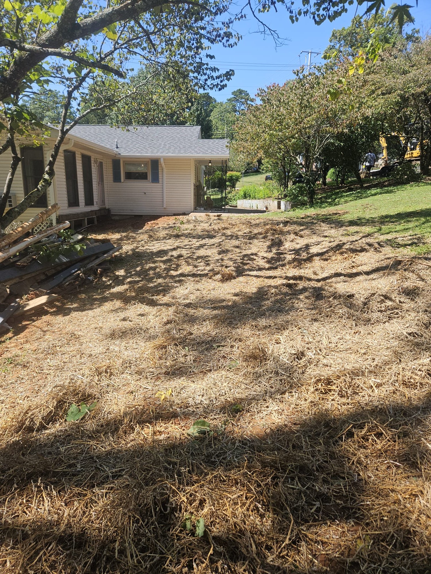 Yard Covered with Straw After Service