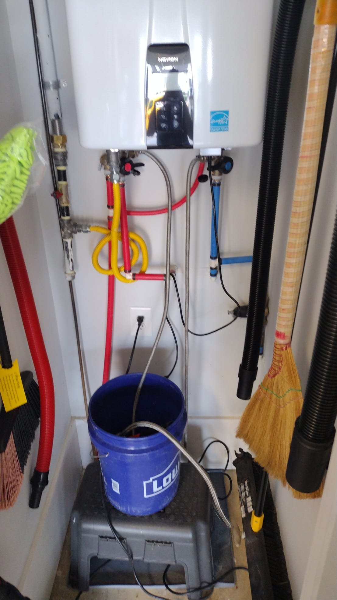 New Navien tankless water heater being flushed