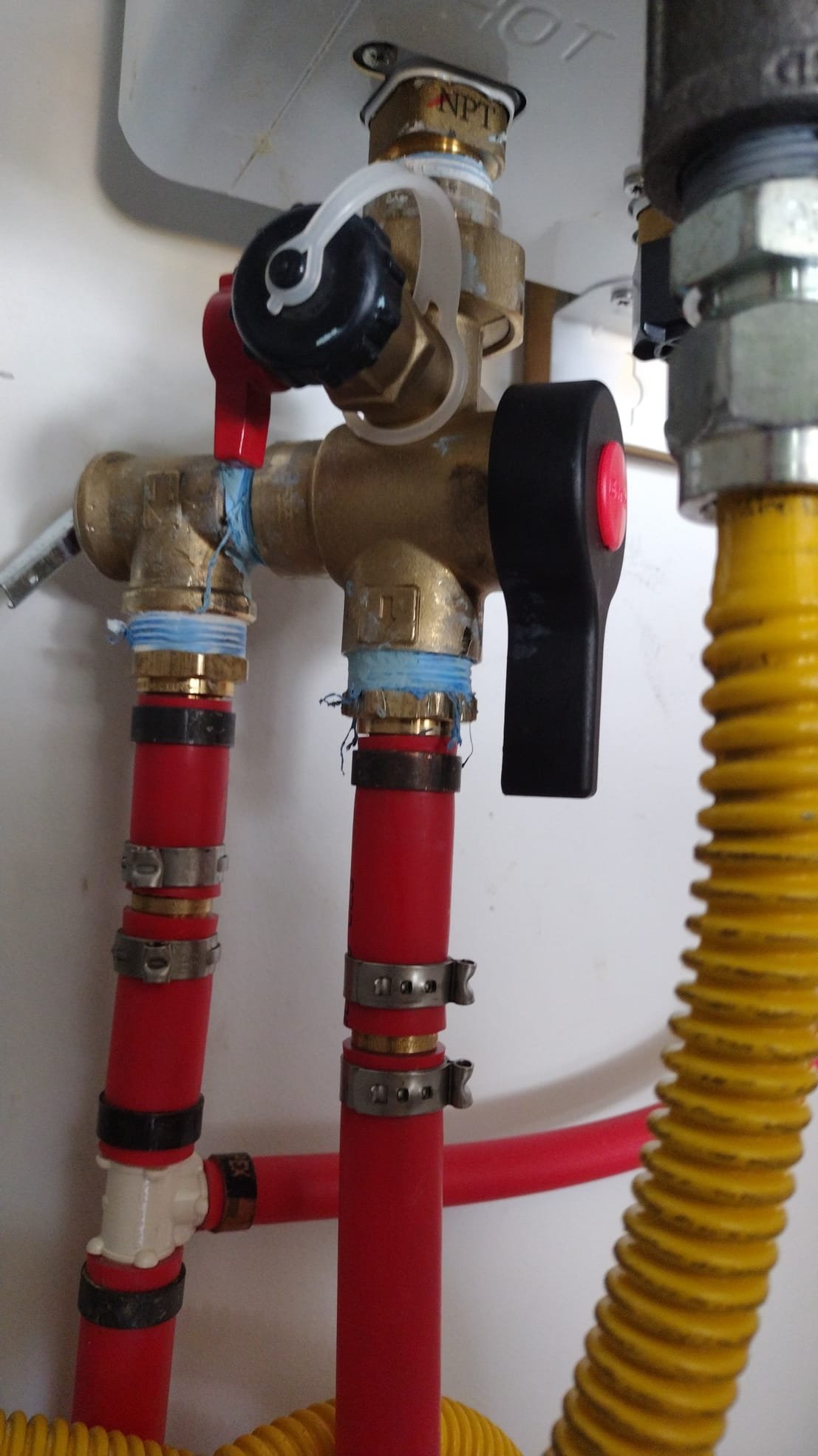 Brass valves and PEX piping installed professionally