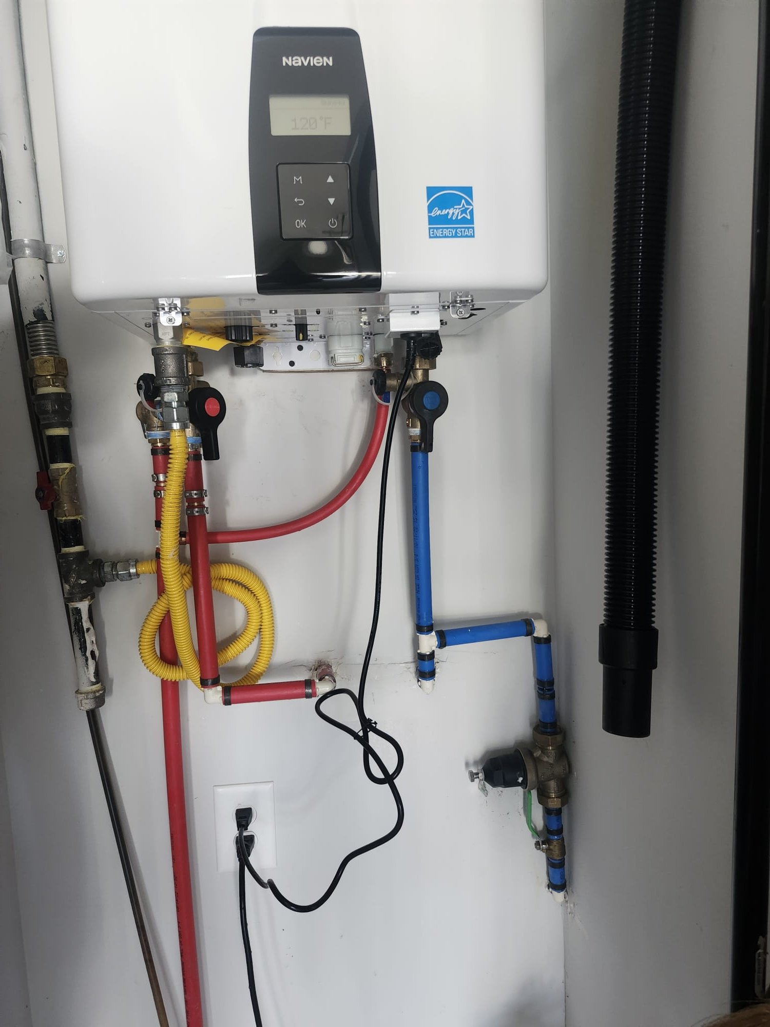 New tankless water heater safely installed and running