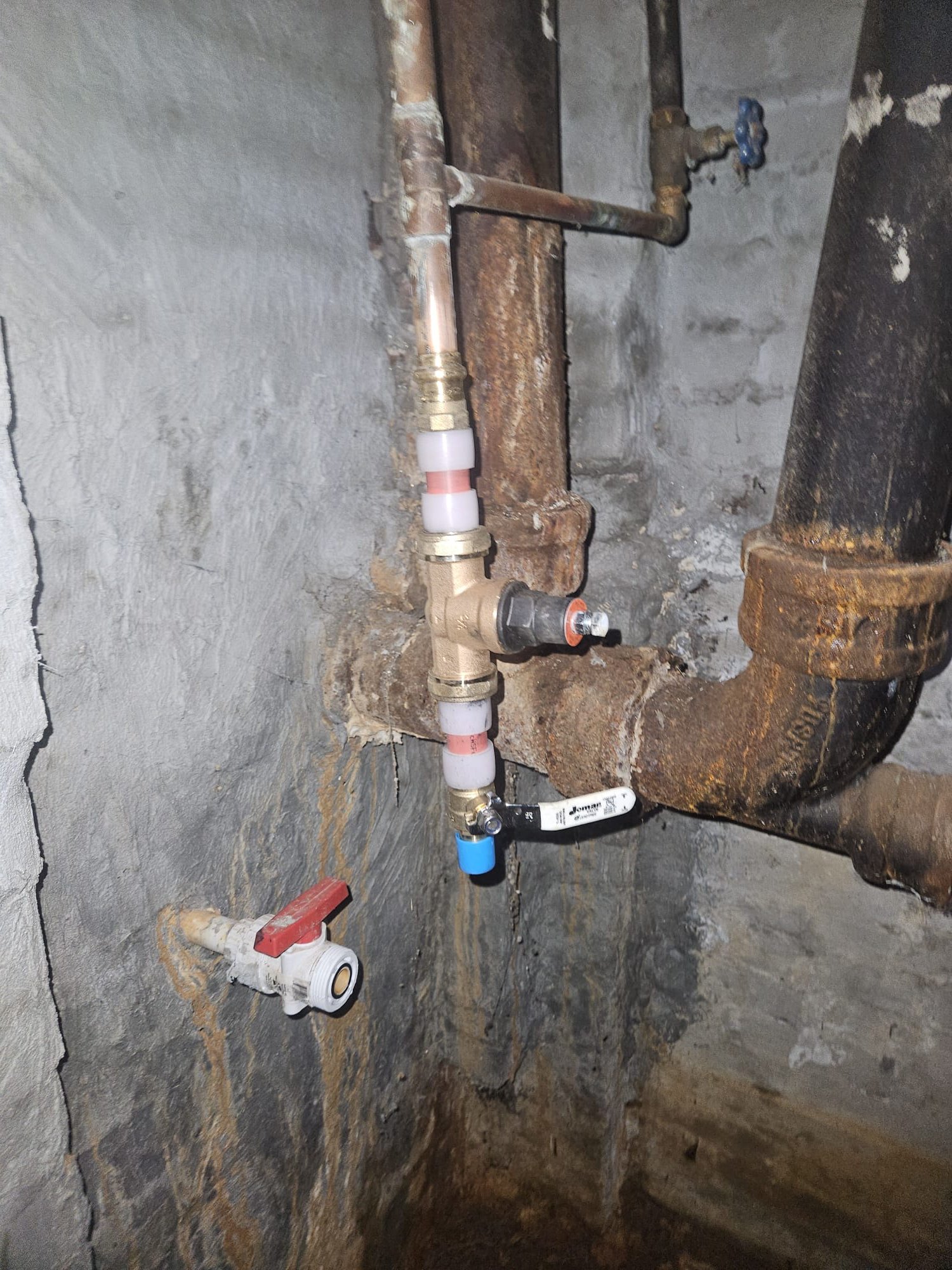 Modern fittings added to existing plumbing system