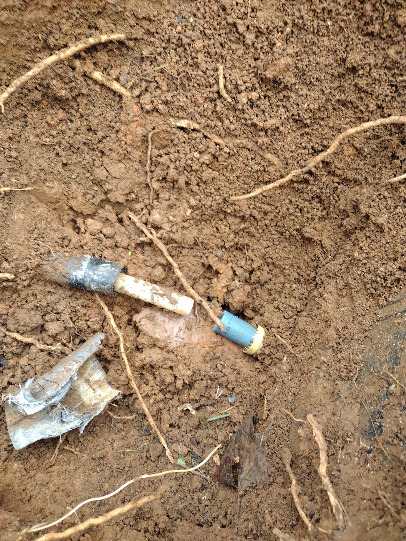 Broken Plastic Pipe in the Yard