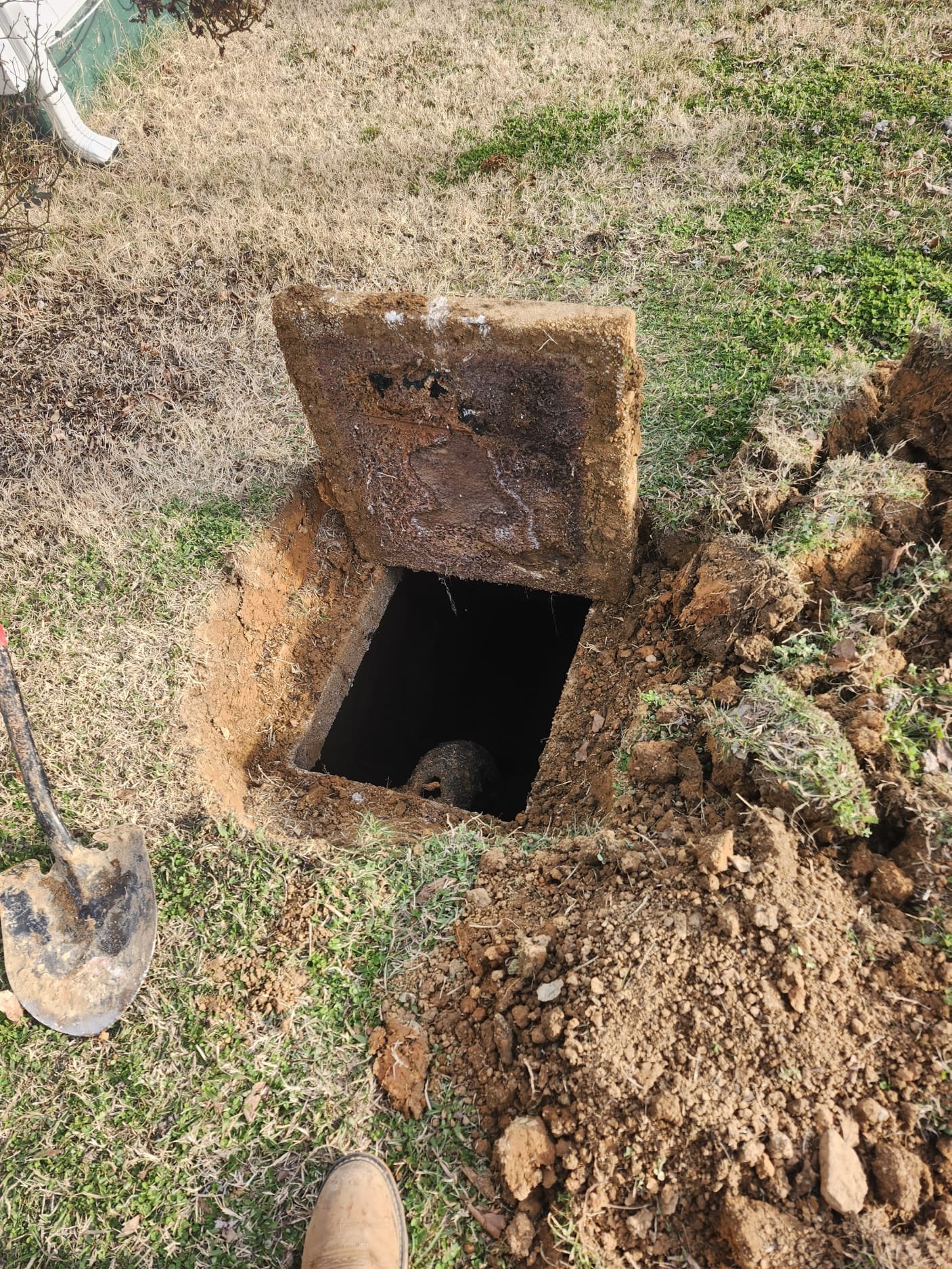 Excavation at septic tank access point