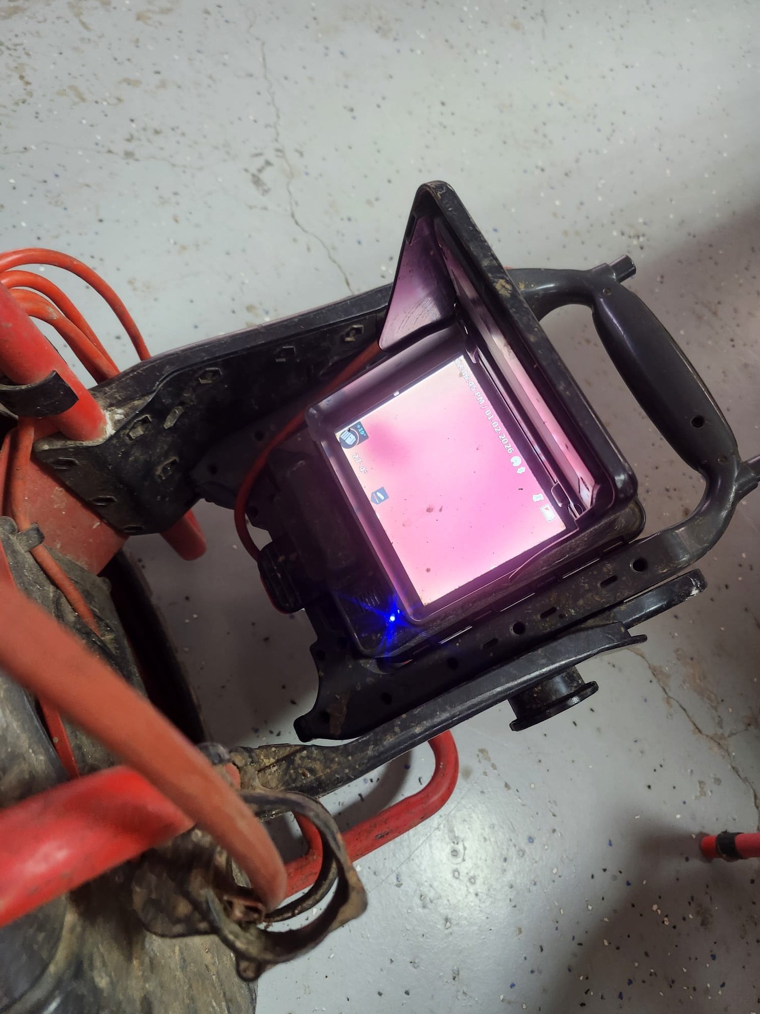 Plumbing inspection camera system displaying a live feed of pipe interior.