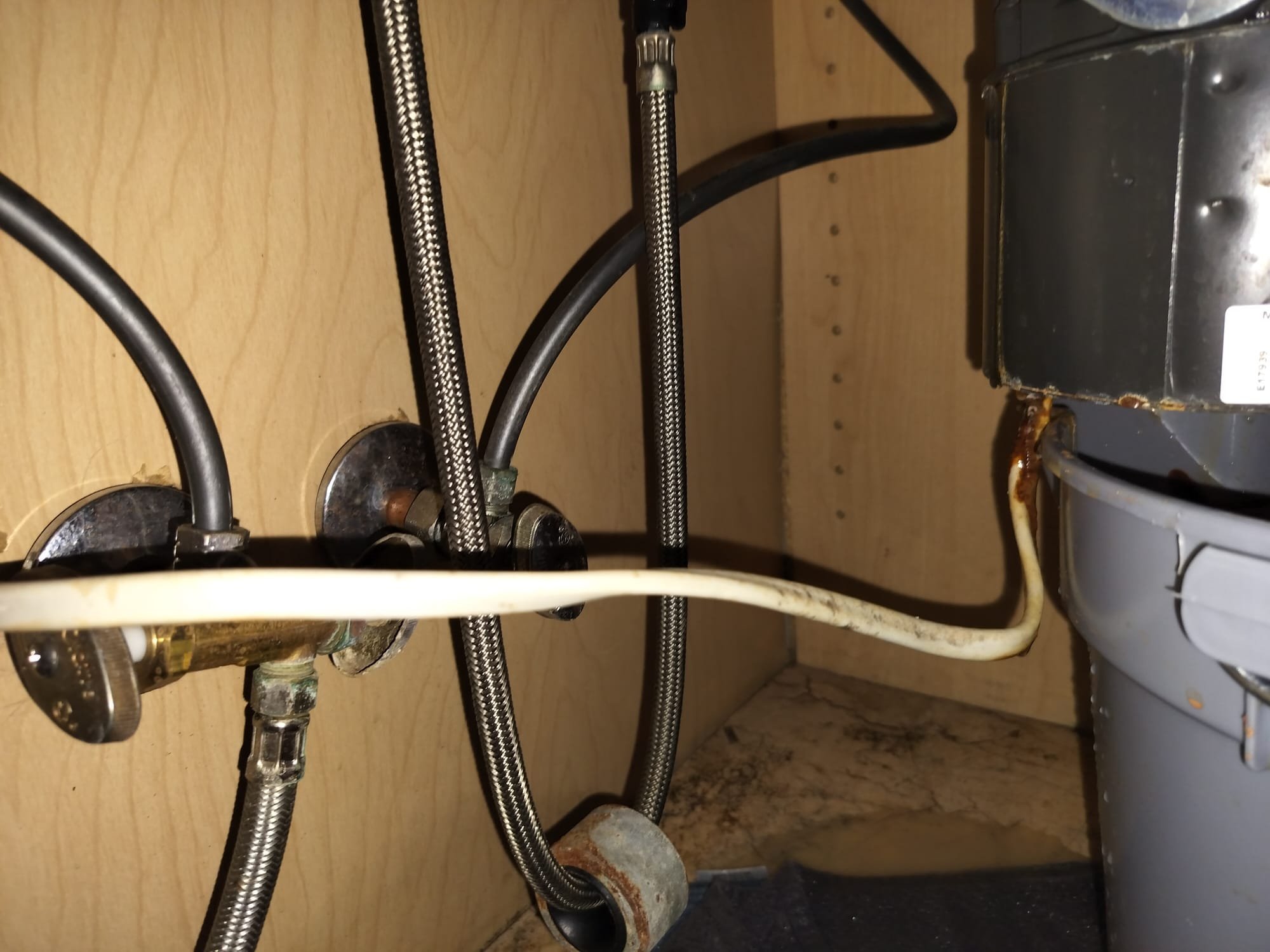 Braided supply lines and corroded shut-off valves under a sink