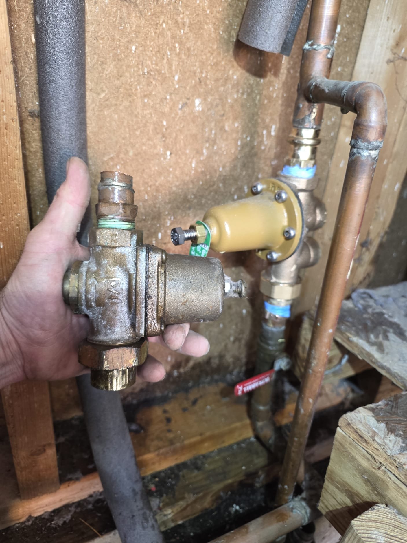 Old and new pressure reducing valves side by side