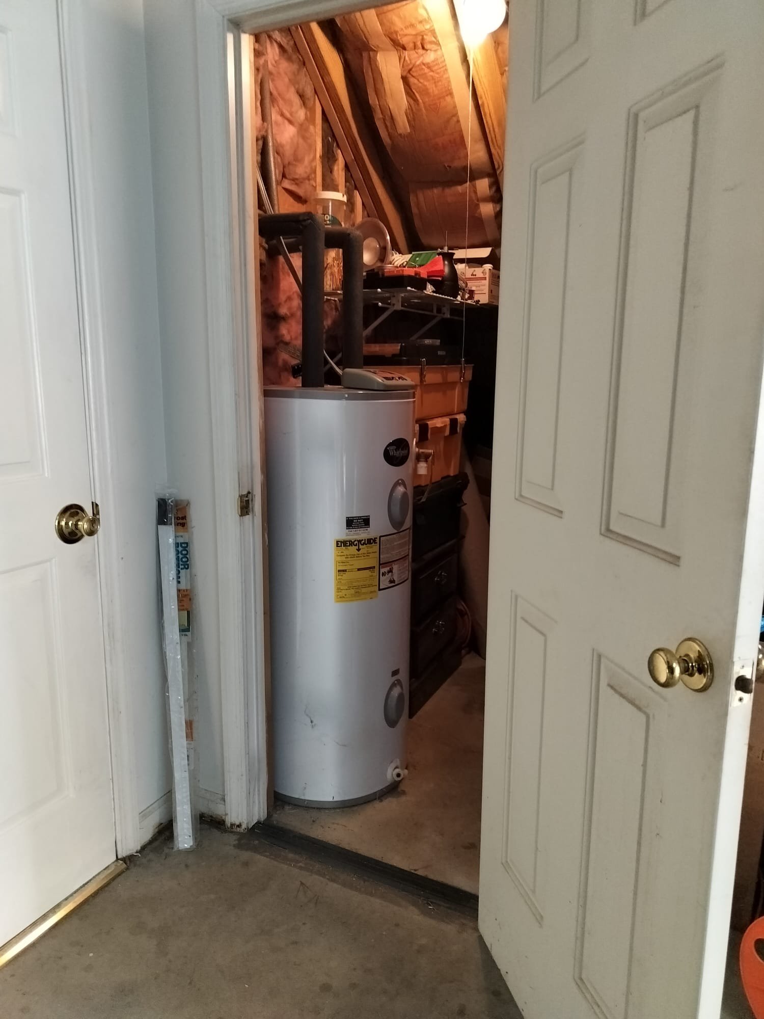 Whirlpool water heater in a utility space, fresh from installation