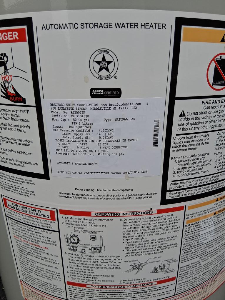 Newly installed water heater label and clean exterior