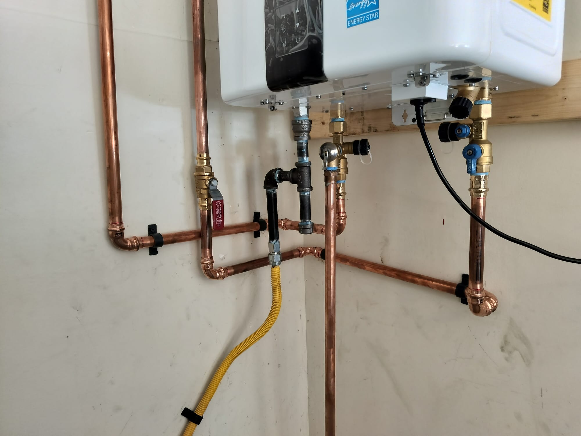 Modern tankless water heater with clean connections